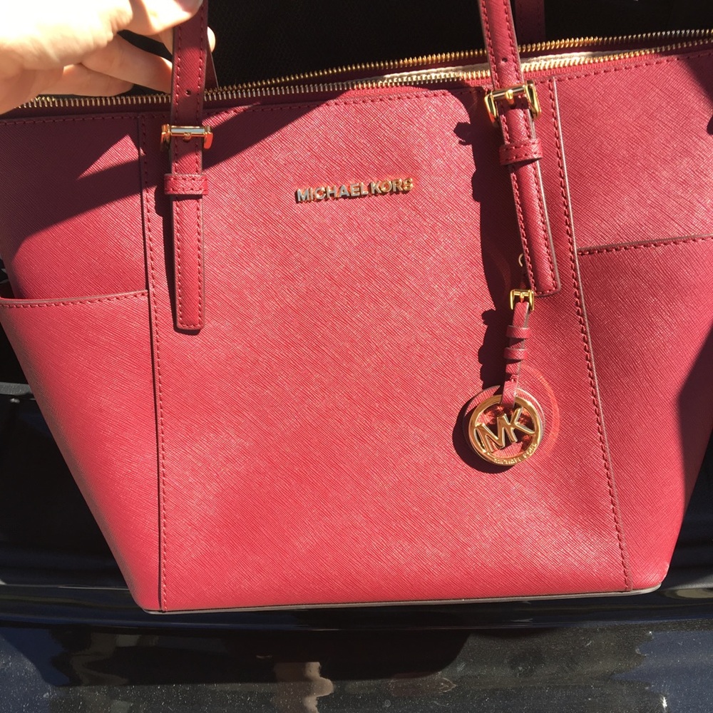 Burgundy Michael Kors handbag